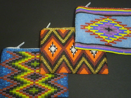 Brightly beaded coin purse. Bold Native-style design. Fully s